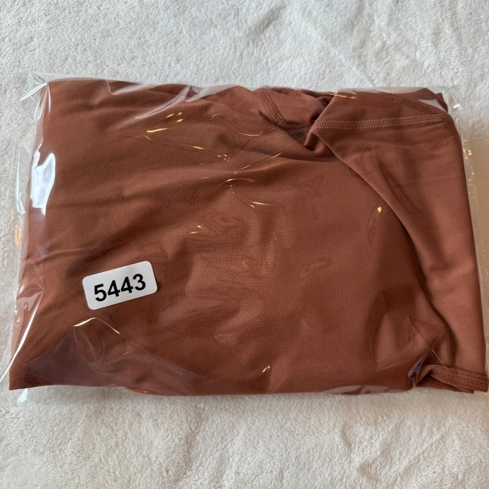 New! Free Movemnt x Free People Never Better One-Piece Brown 45443